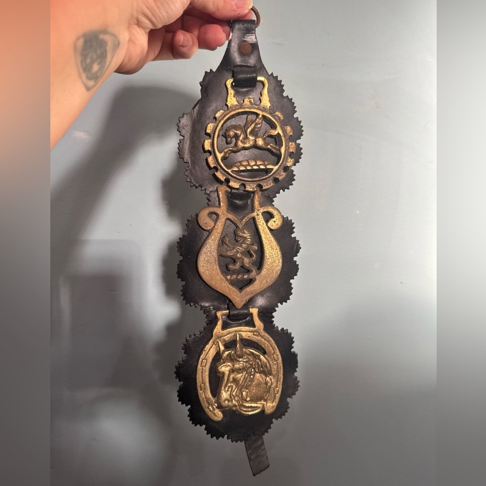 Vintage set of horse brasses on a leather strap England. Good Luck. Victorian